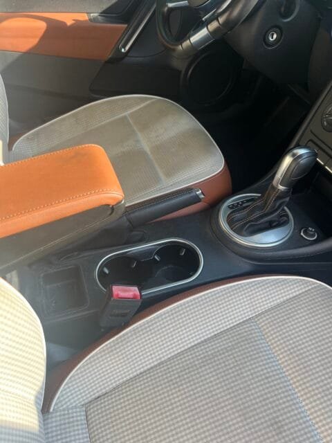 Volkswagen Beetle cloth seat inserts soiled before a Deep Interior Detail