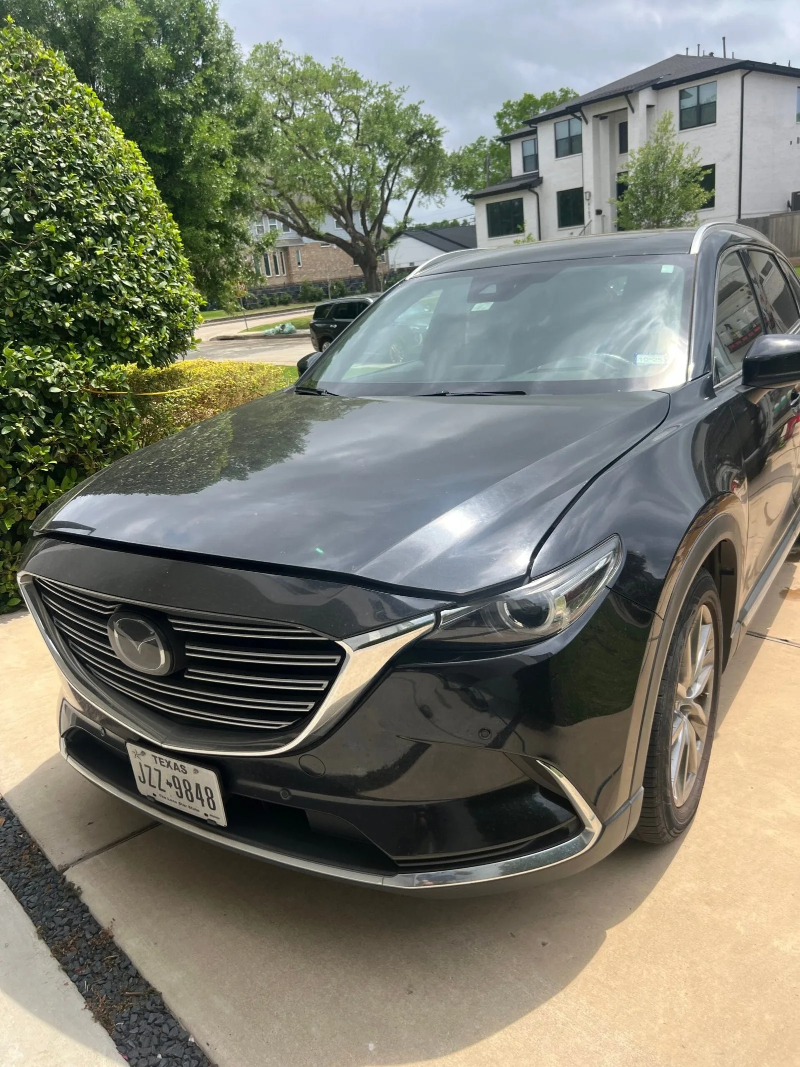 Ceramic coating result on black SUV with deep gloss in Houston