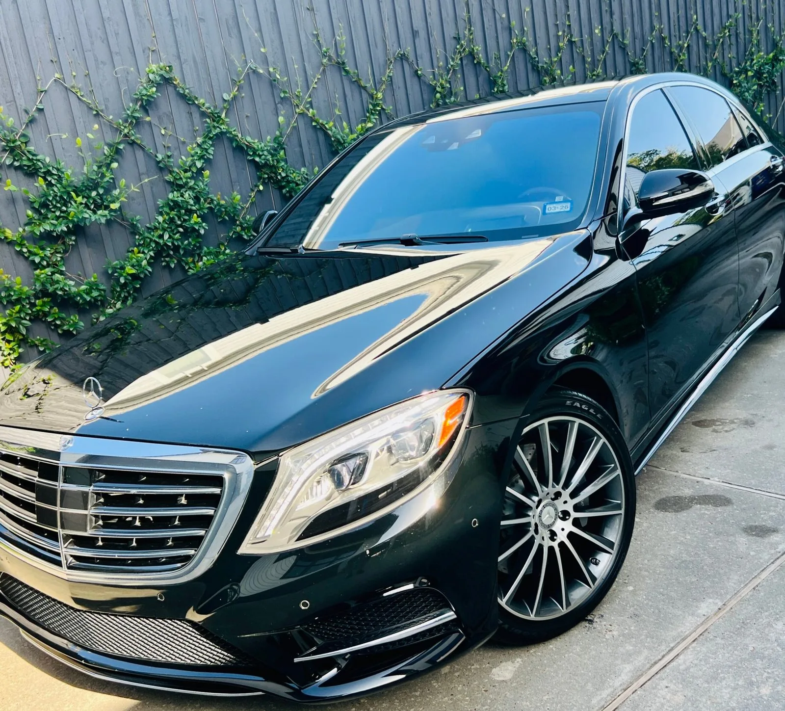 Houston ceramic coating finish showing sharp reflections on dark paint