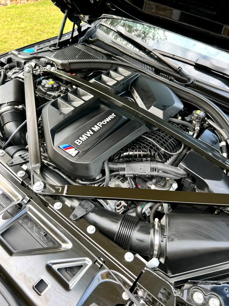 Exterior detailing and engine bay result on luxury vehicle serviced in the Sugar Land Houston area