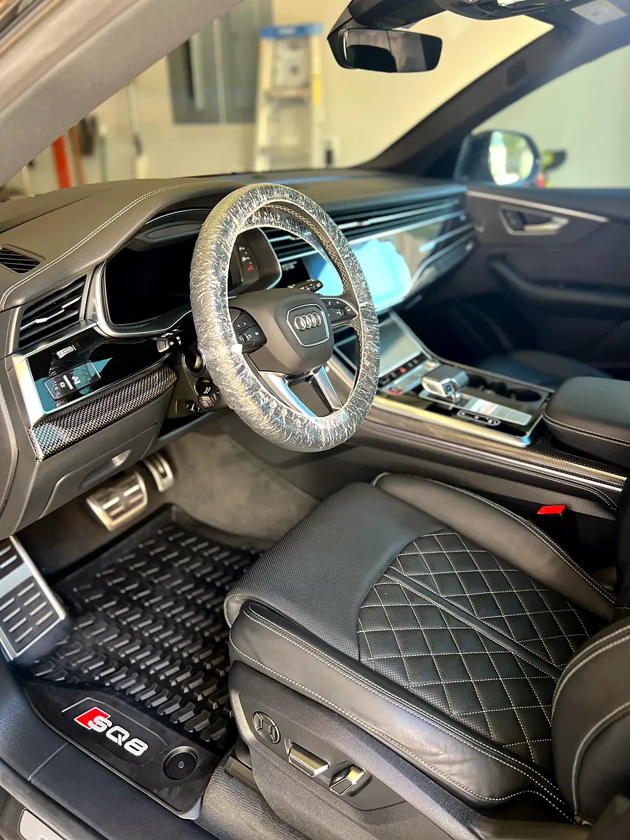 Interior detailing result showing clean leather seats and restored cabin in Pearland TX