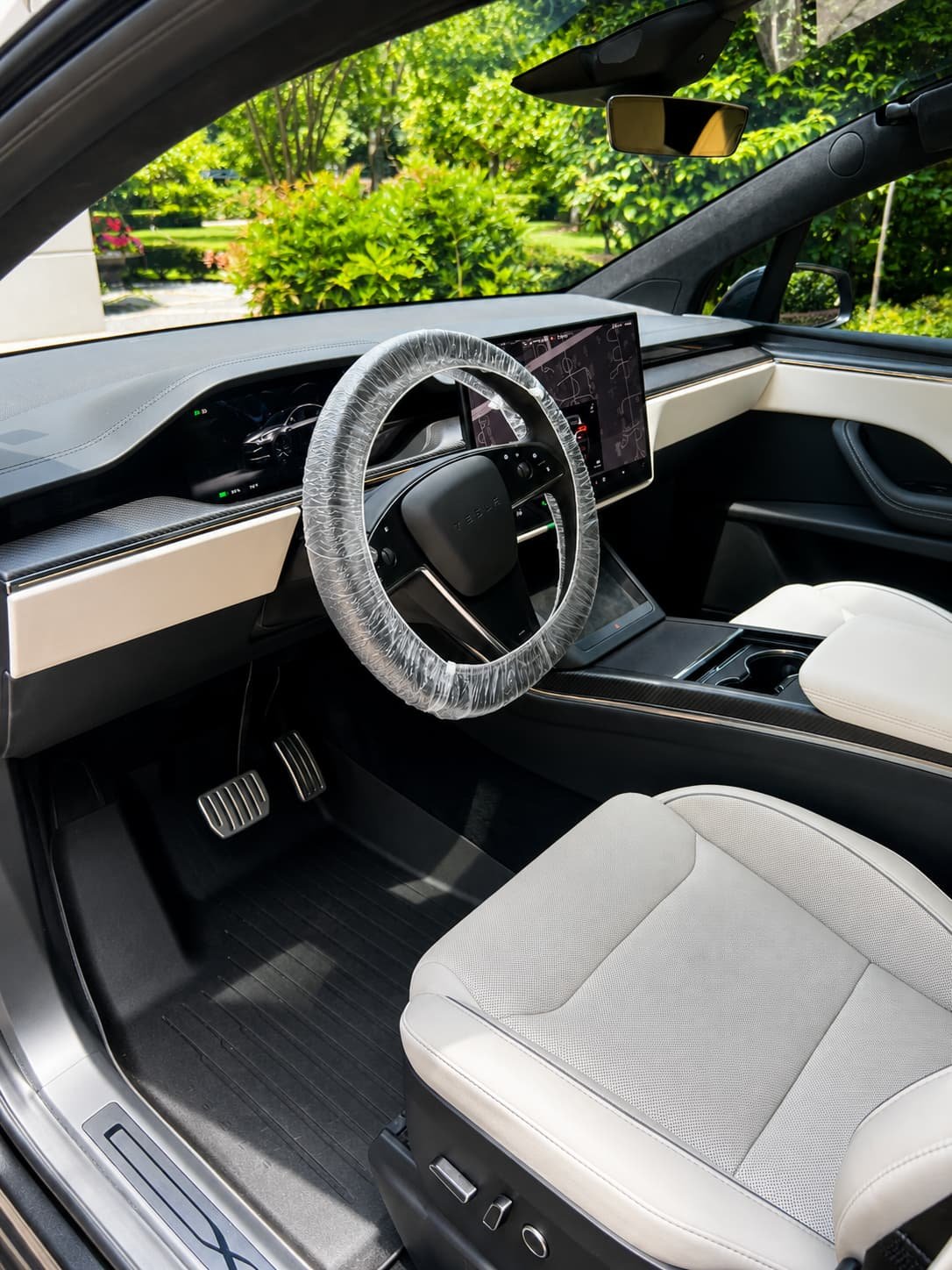 tesla interior detailing Interior detailing result showing clean leather seats and restored cabin in Katy TX