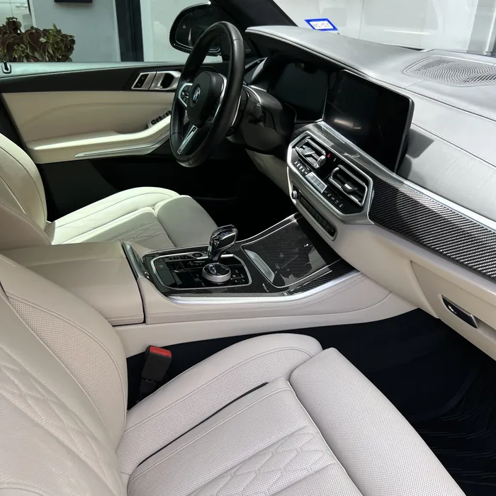 BMW X5 interior with white leather after an interior detail