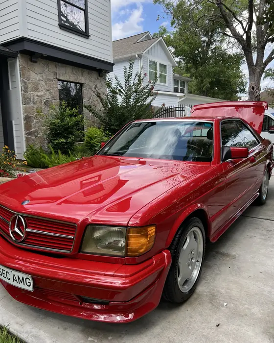 Red classic Mercedes-Benz 560 SEC after ceramic coating