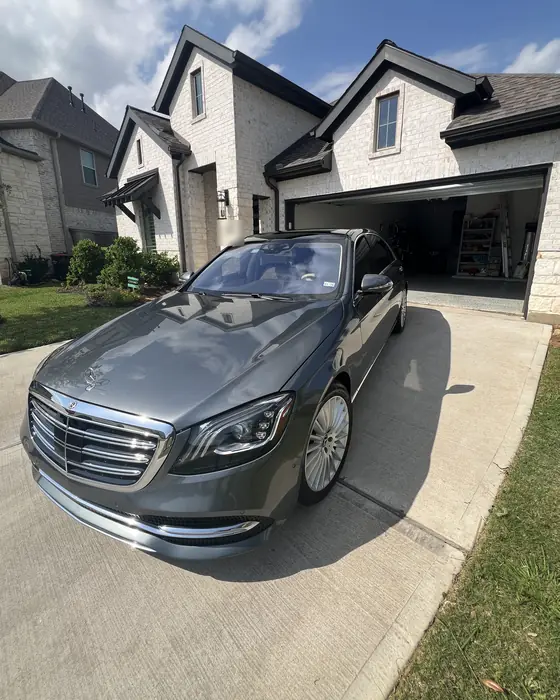 Grey Mercedes-Benz S-Class after ceramic coating, on a residential driveway