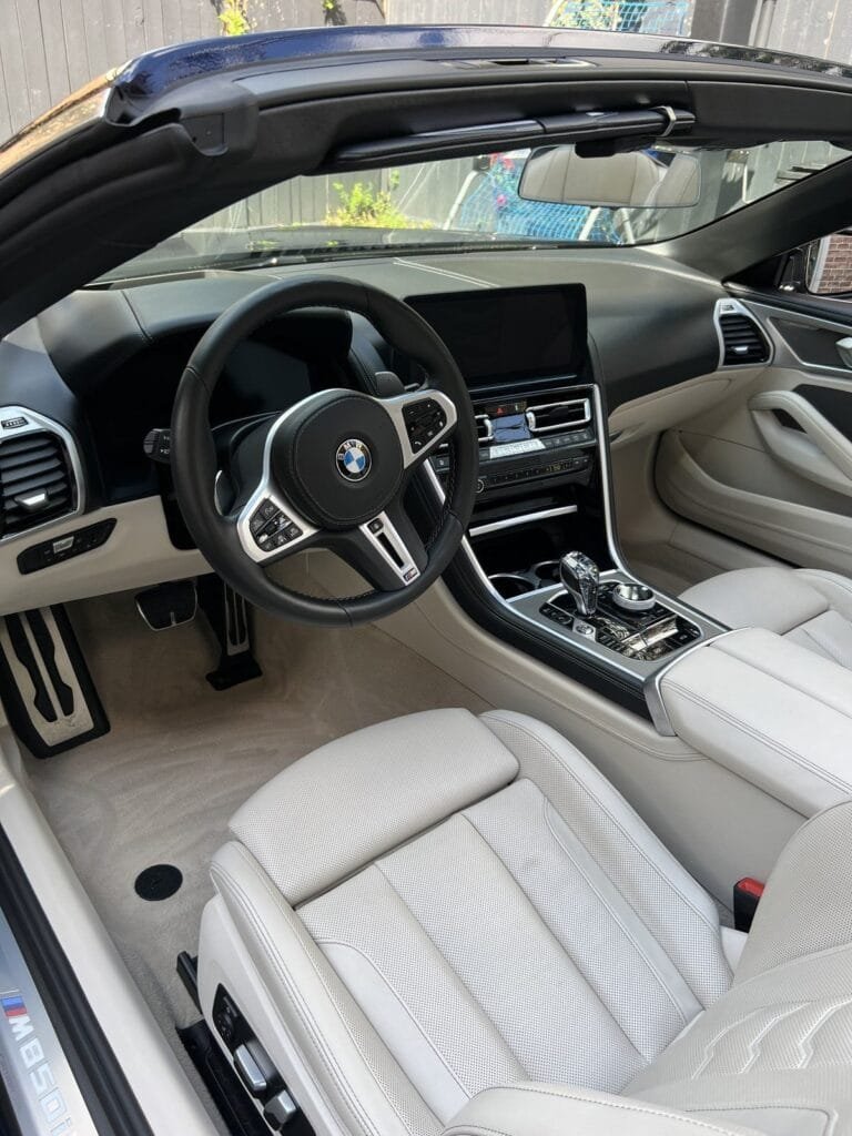 BMW M850i convertible with ivory leather seats after an Azul interior maintenance detail