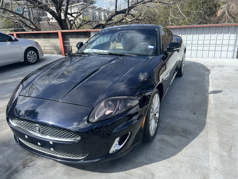 The same Jaguar XK after a controlled One-Step Paint Correction and ceramic wax