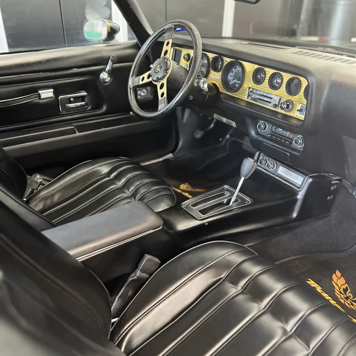 Classic Pontiac Trans Am black interior after an interior detail