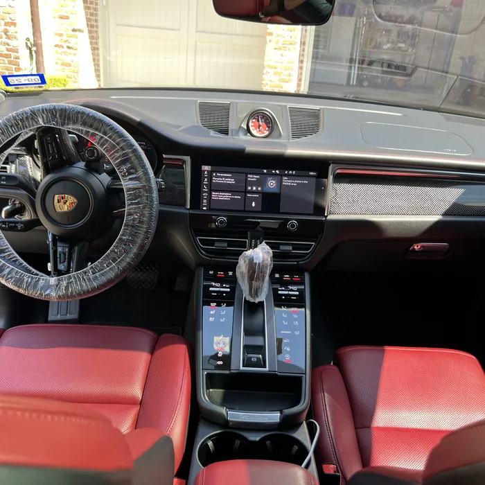 Porsche Macan interior with red leather seats after an interior detail