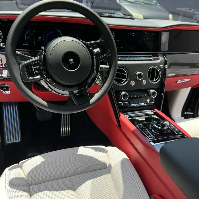 Rolls-Royce Cullinan interior with white and red leather after an interior detail