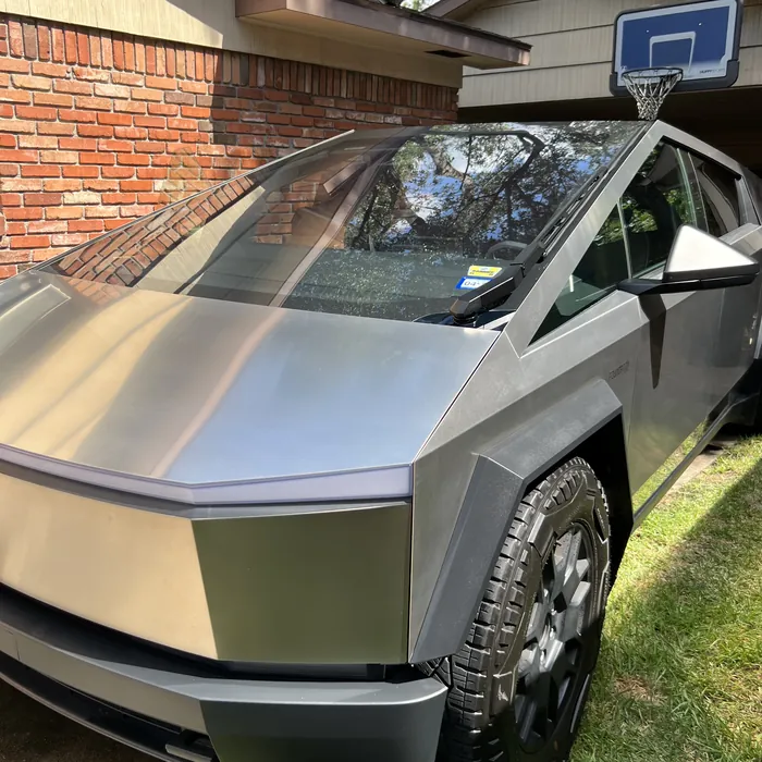 Tesla Cybertruck after a hand wash in a driveway