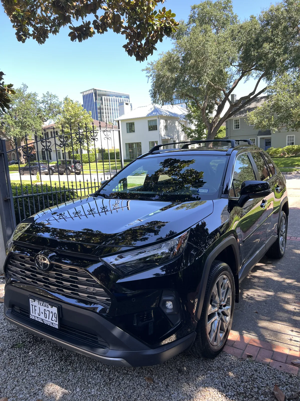 Black 2023 Toyota RAV4 after tree residue removal paint correction and paint sealant in Houston